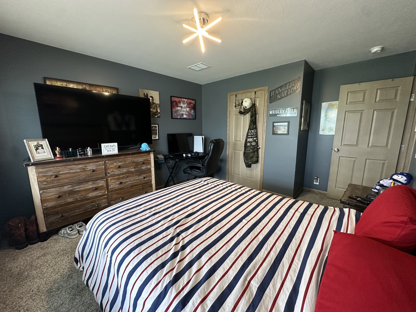 513 North 10th Street Benton, IL 62812 - Photo 62 of 75 a bedroom with a bed and a flat screen tv