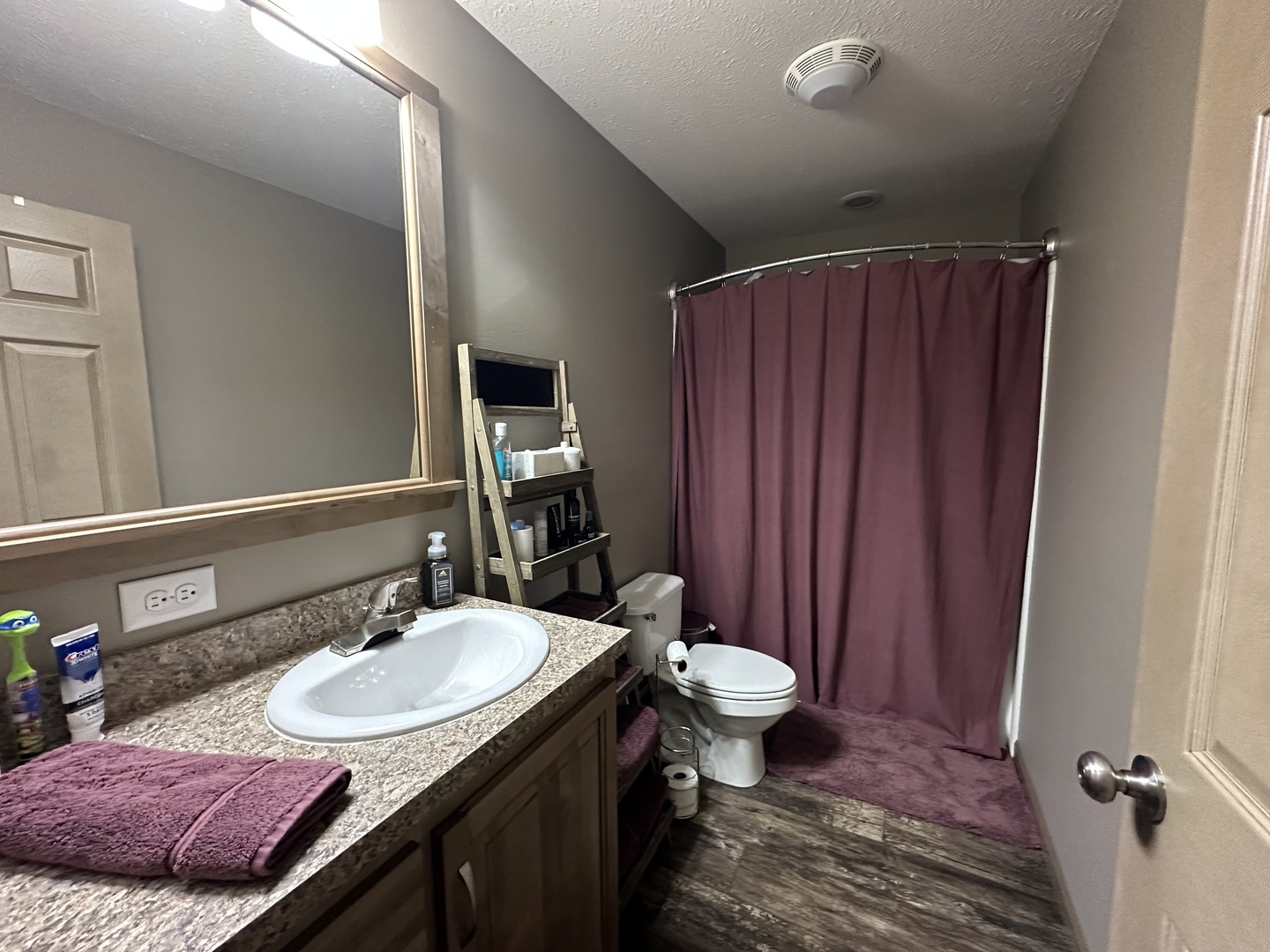 513 North 10th Street Benton, IL 62812 - Photo 64 of 75 a bathroom with a granite countertop sink and a mirror