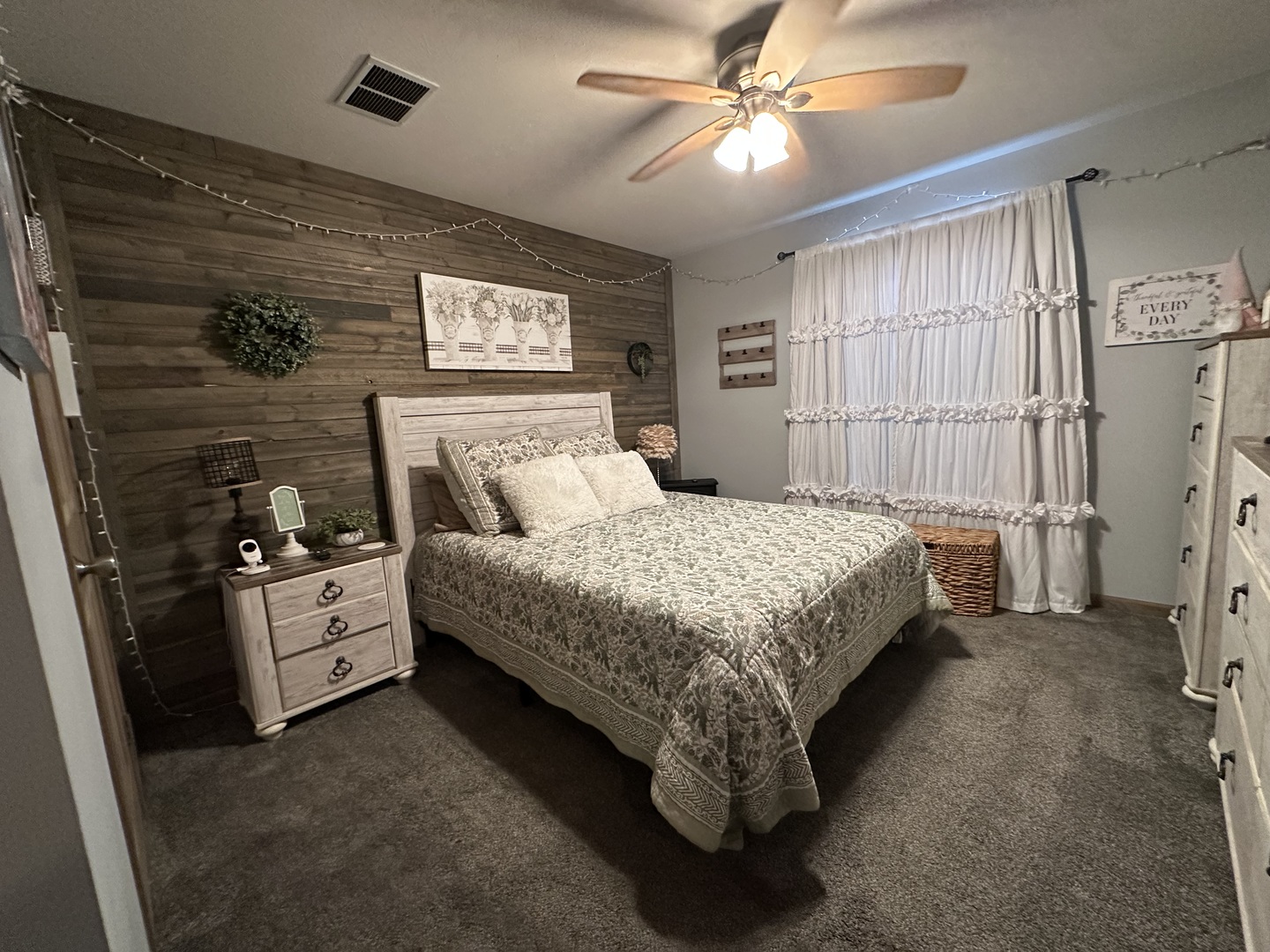 513 North 10th Street Benton, IL 62812 - Photo 69 of 75 a bedroom with a bed and a chandelier