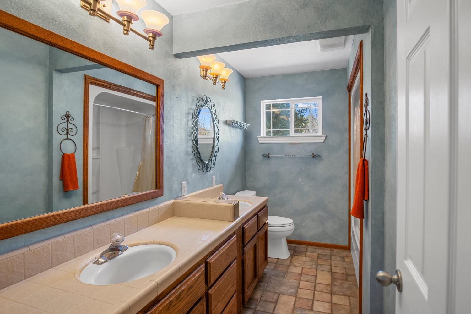 17164 Keyes Road Snelling, CA 95369 - Photo 11 of 51 a bathroom with a sink and a mirror