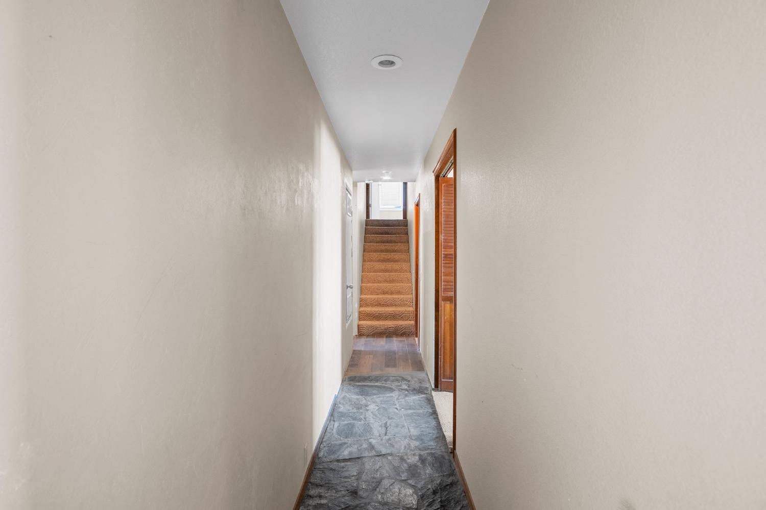 17164 Keyes Road Snelling, CA 95369 - Photo 12 of 51 a view of a hallway with wooden floor and entryway