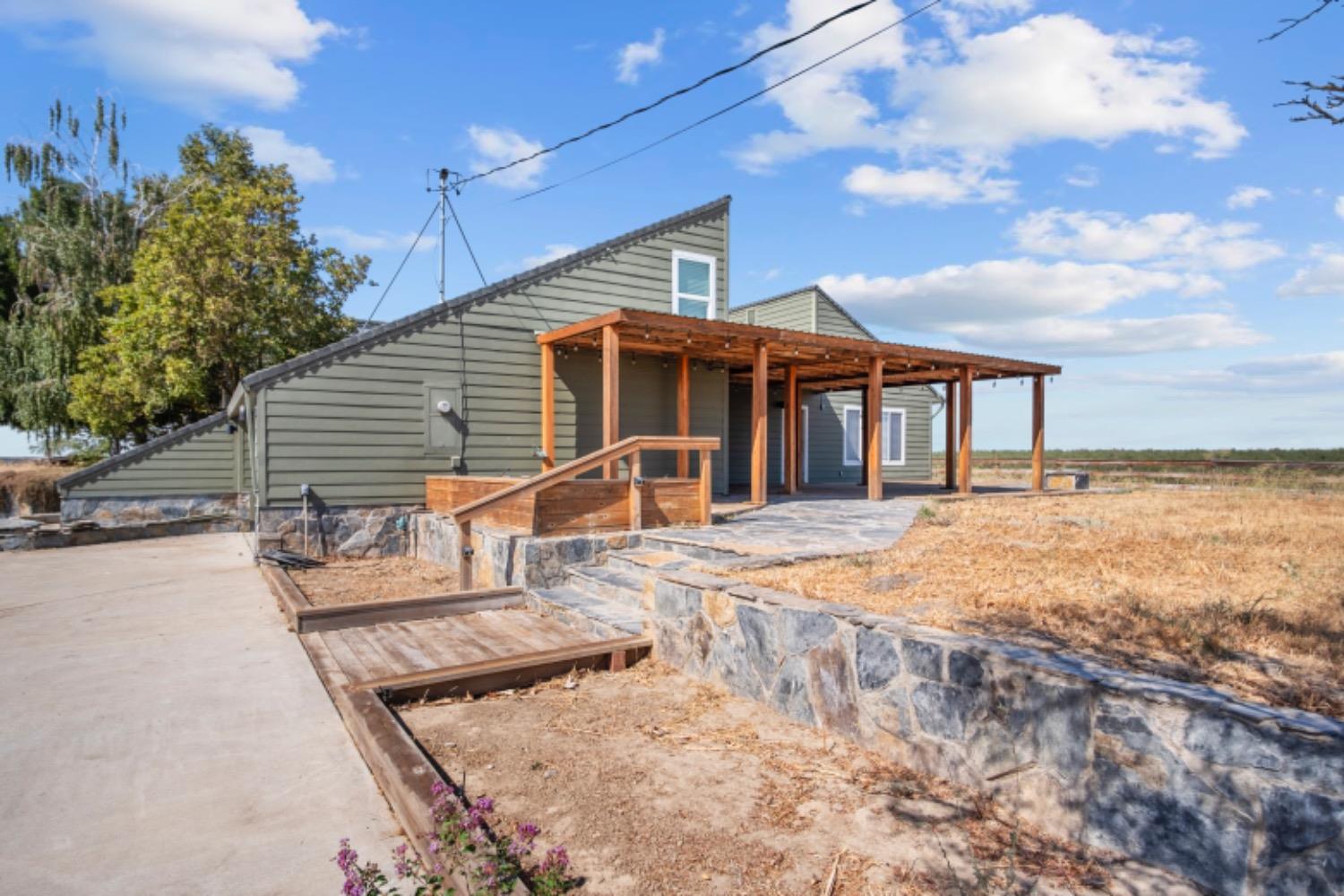 17164 Keyes Road Snelling, CA 95369 - Photo 6 of 51 a front view of a house with a yard