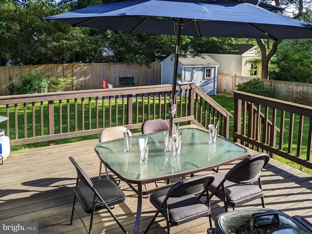 a balcony view with a seating space