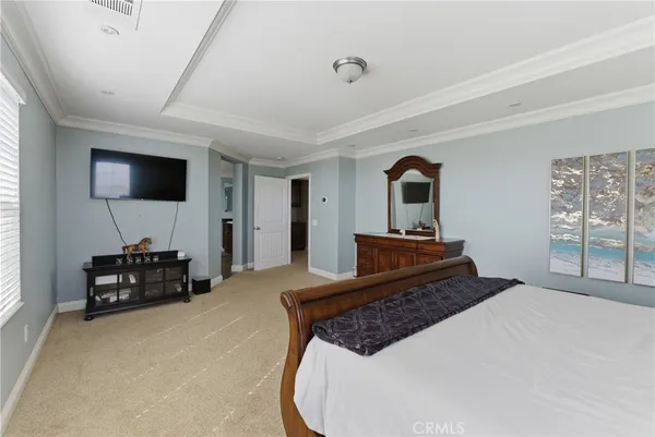 a view of a patio with table and chairs with wooden floor and fence