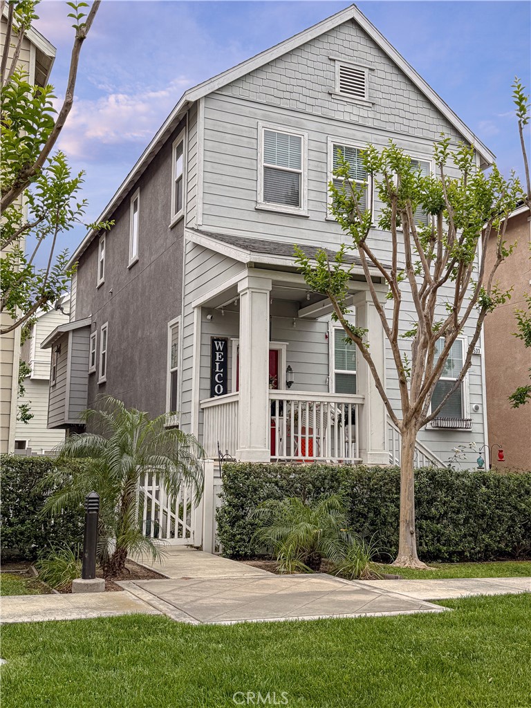 front view of a house with a yard