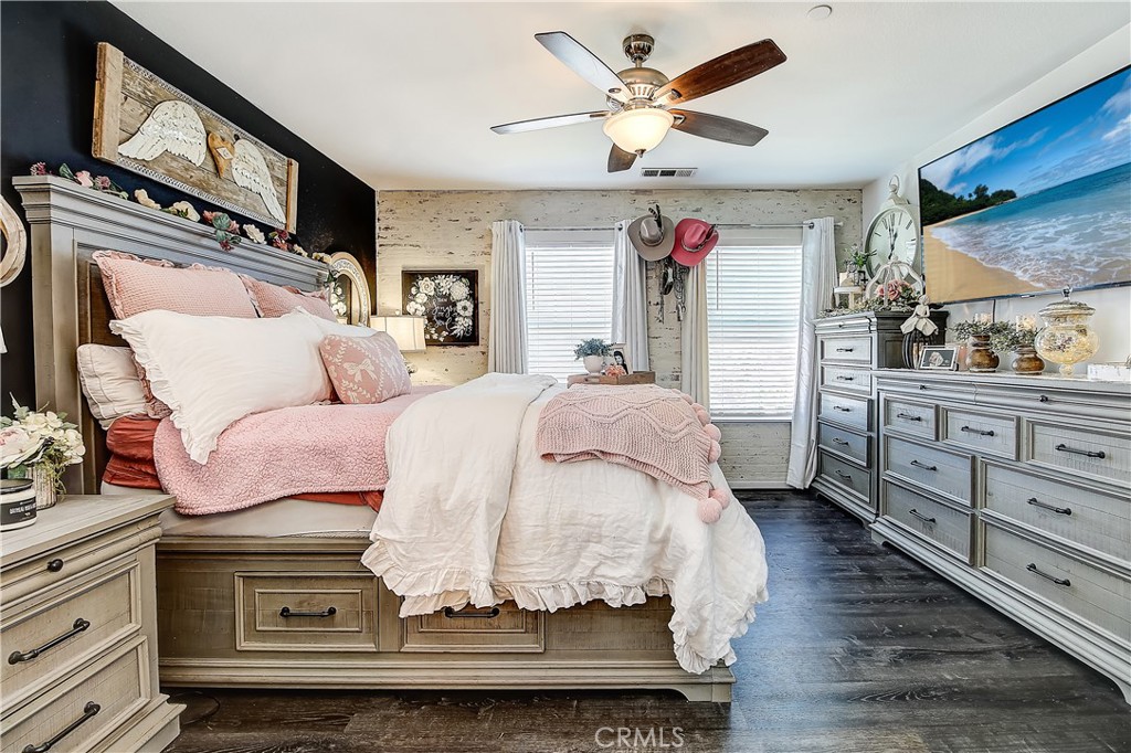3533 Millhouse Court Riverside, CA 92503 - Photo 19 of 37 a living room with furniture and a flat screen tv