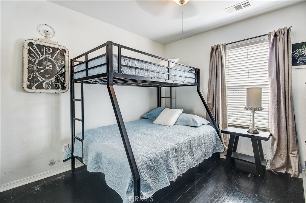 3533 Millhouse Court Riverside, CA 92503 - Photo 25 of 37 a bedroom with a bed and a window