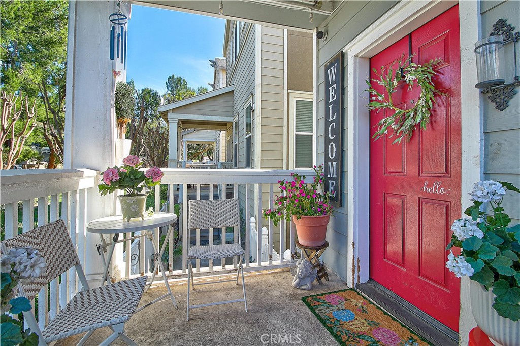 3533 Millhouse Court Riverside, CA 92503 - Photo 3 of 37 a view of a house with a potted plants and a chair