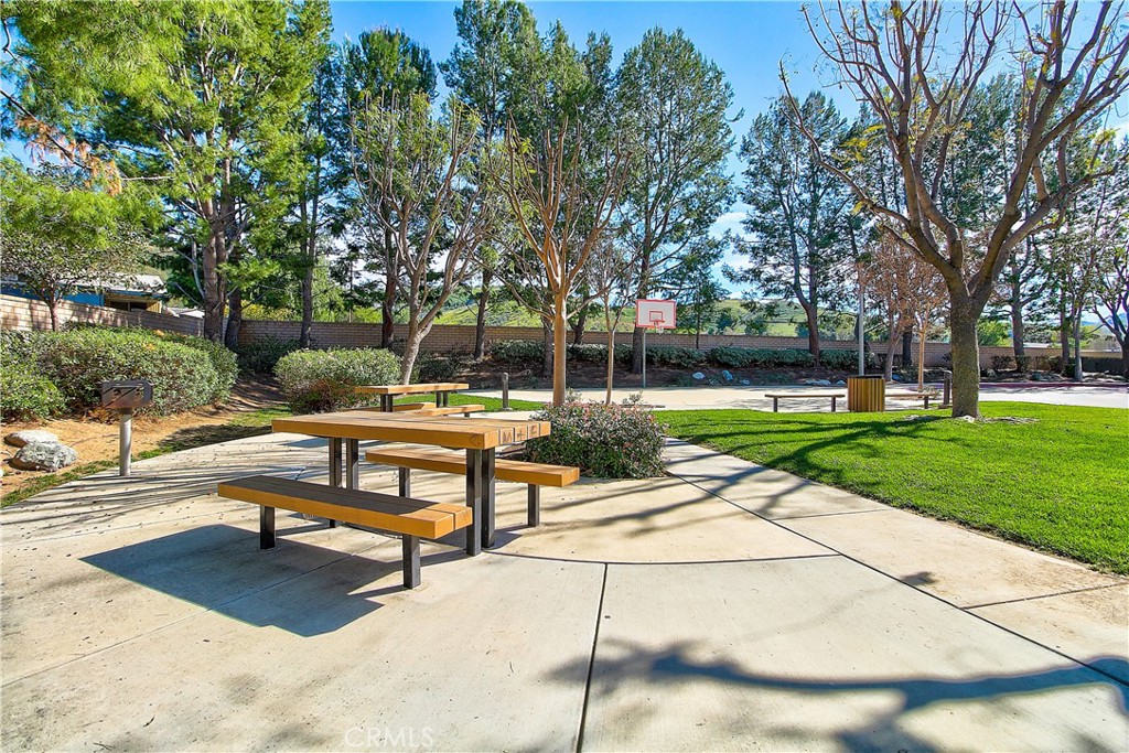 3533 Millhouse Court Riverside, CA 92503 - Photo 34 of 37 a view of a park with bench and trees