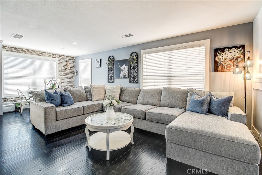 3533 Millhouse Court Riverside, CA 92503 - Photo 9 of 37 a living room with furniture and a large window