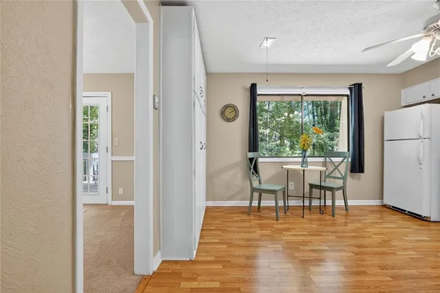 a view of a house with a yard patio and a garden