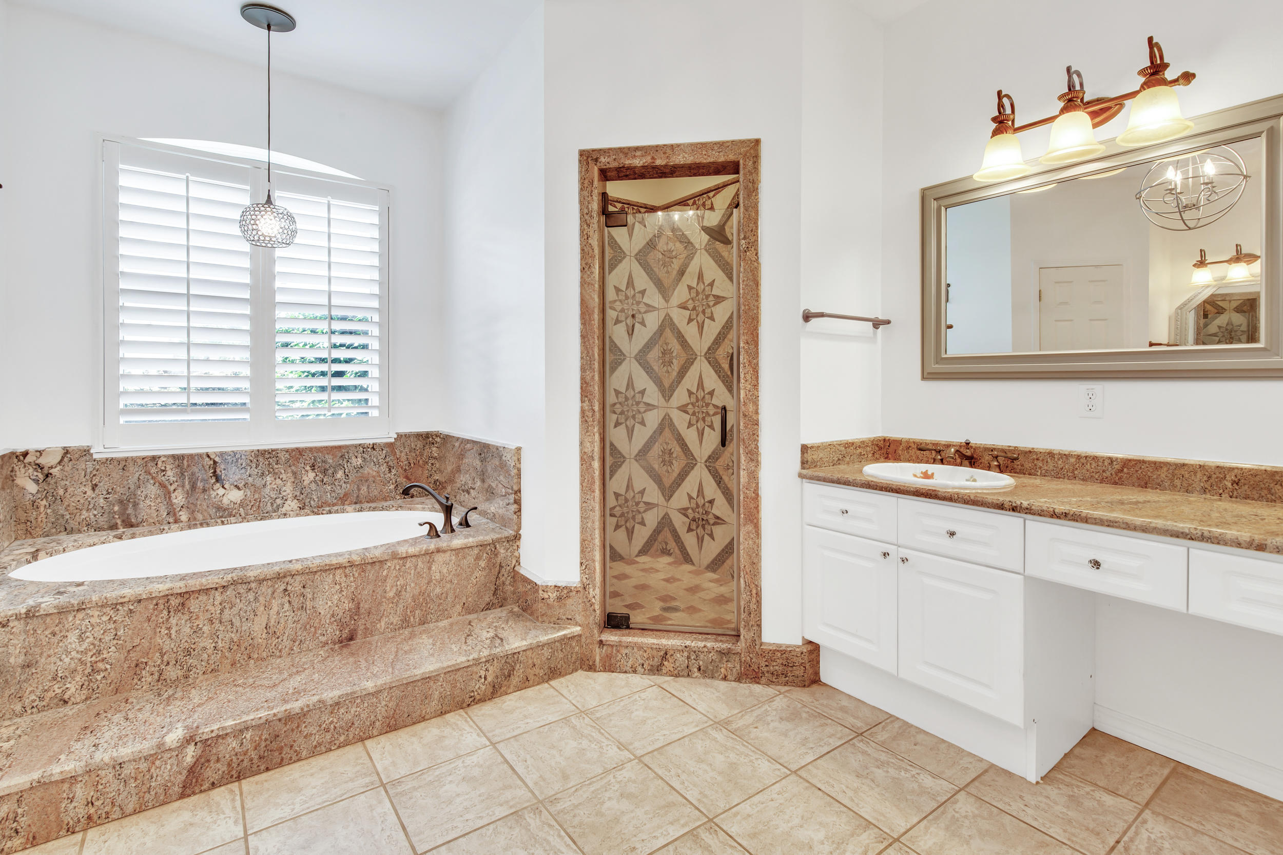 244 Indigo Loop Destin, FL 32550 - Photo 15 of 41 a spacious bathroom with sink shower and bathtub