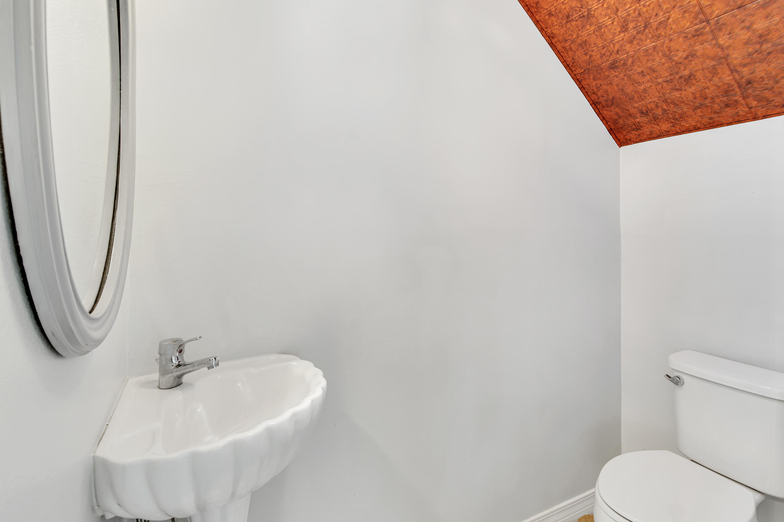 244 Indigo Loop Destin, FL 32550 - Photo 18 of 41 a bathroom with a white sink and a vanity