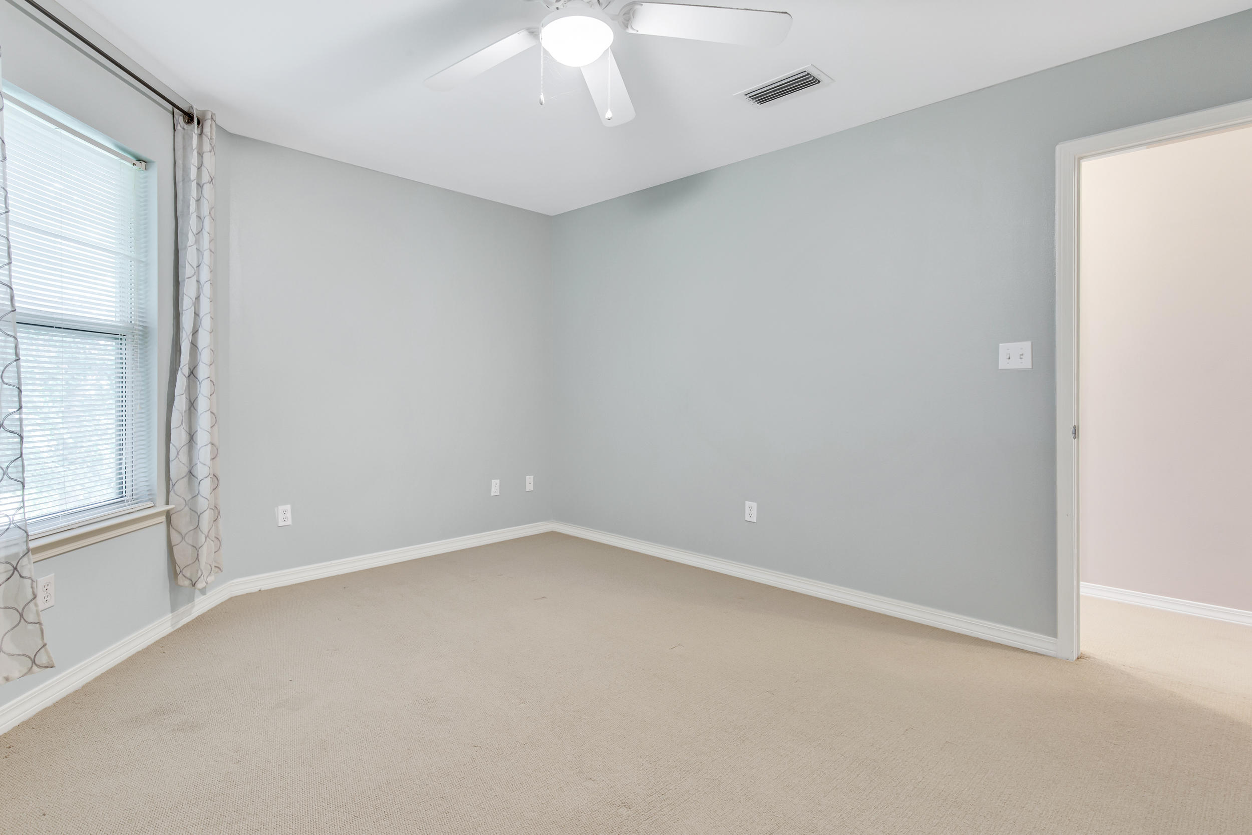 244 Indigo Loop Destin, FL 32550 - Photo 22 of 41 an empty room with a window