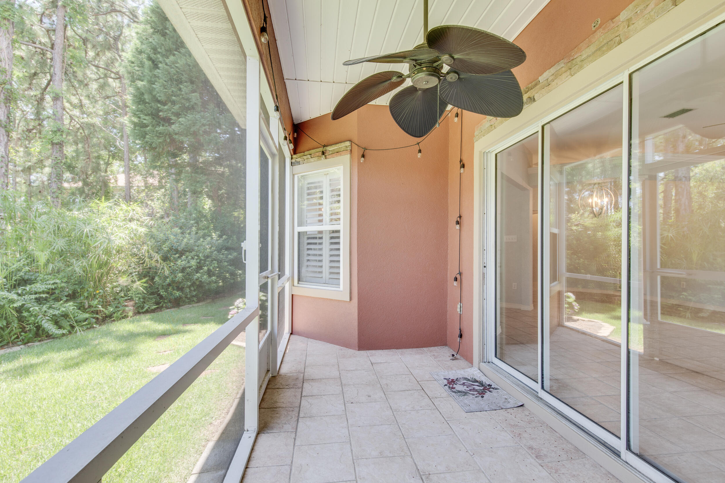 244 Indigo Loop Destin, FL 32550 - Photo 27 of 41 a bathroom with a glass door shower and a sink