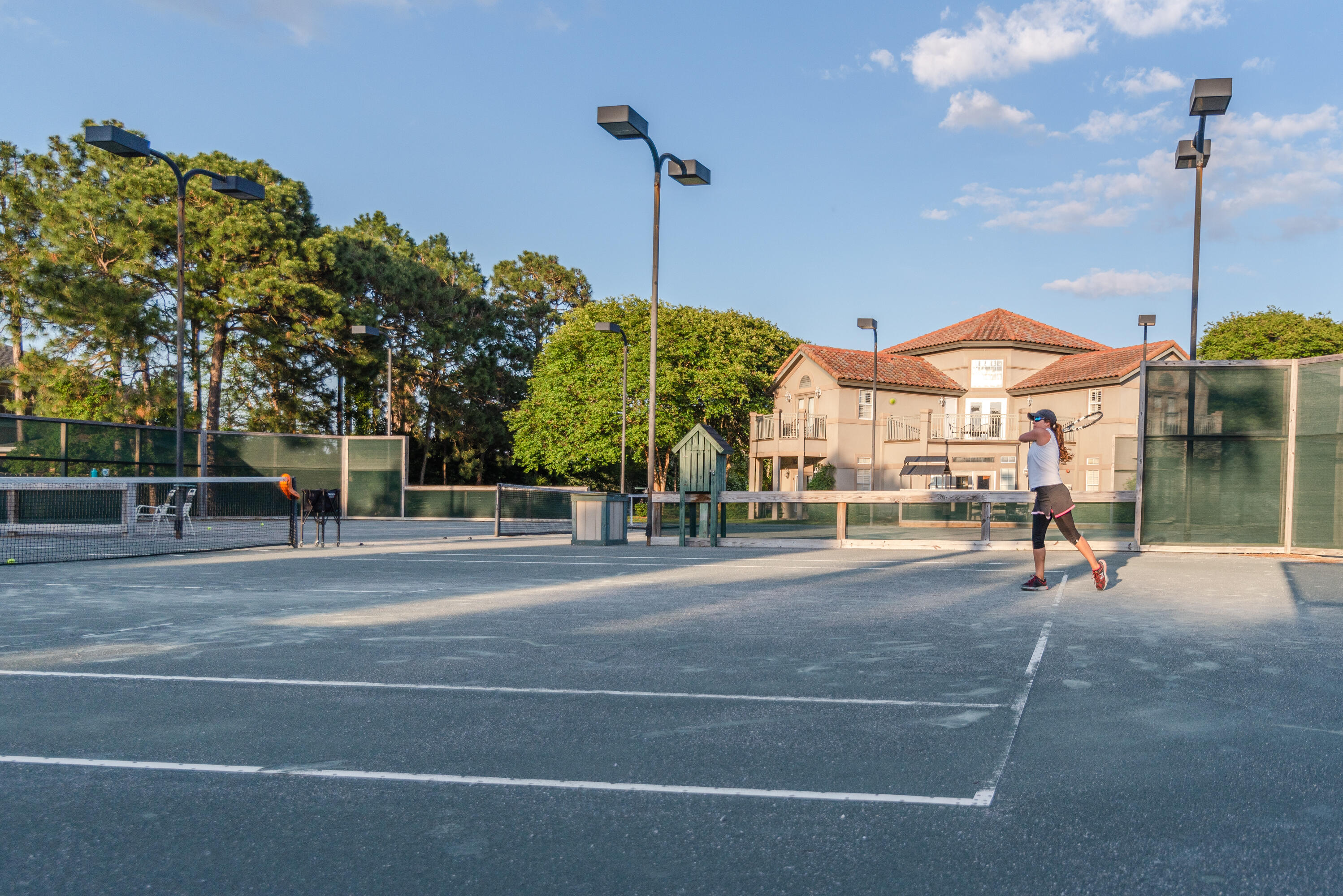 244 Indigo Loop Destin, FL 32550 - Photo 40 of 41 a view of a street with a building in the background