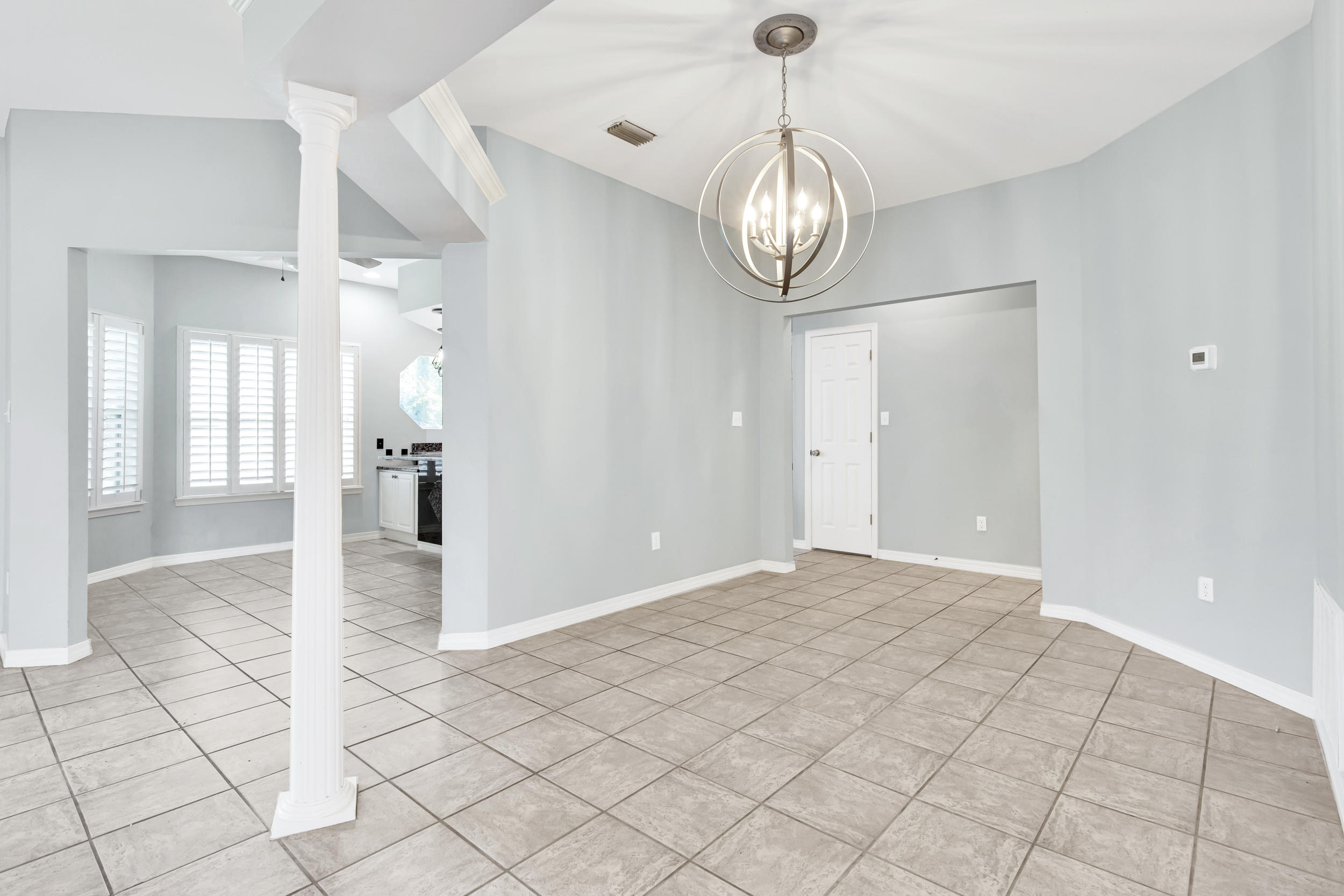 244 Indigo Loop Destin, FL 32550 - Photo 5 of 41 a view of an empty room and wooden floor