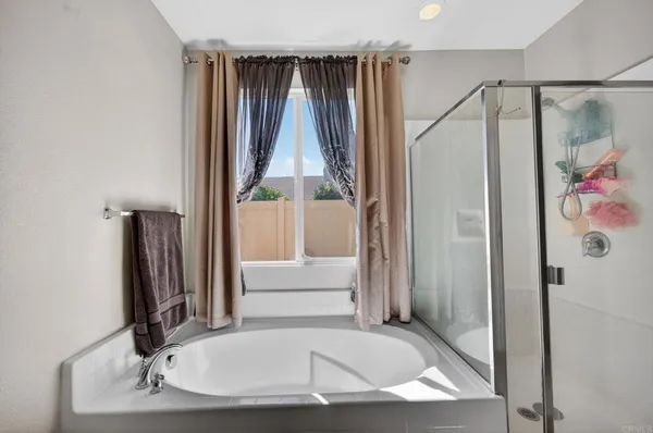 a bathroom with a sink double vanity and a mirror