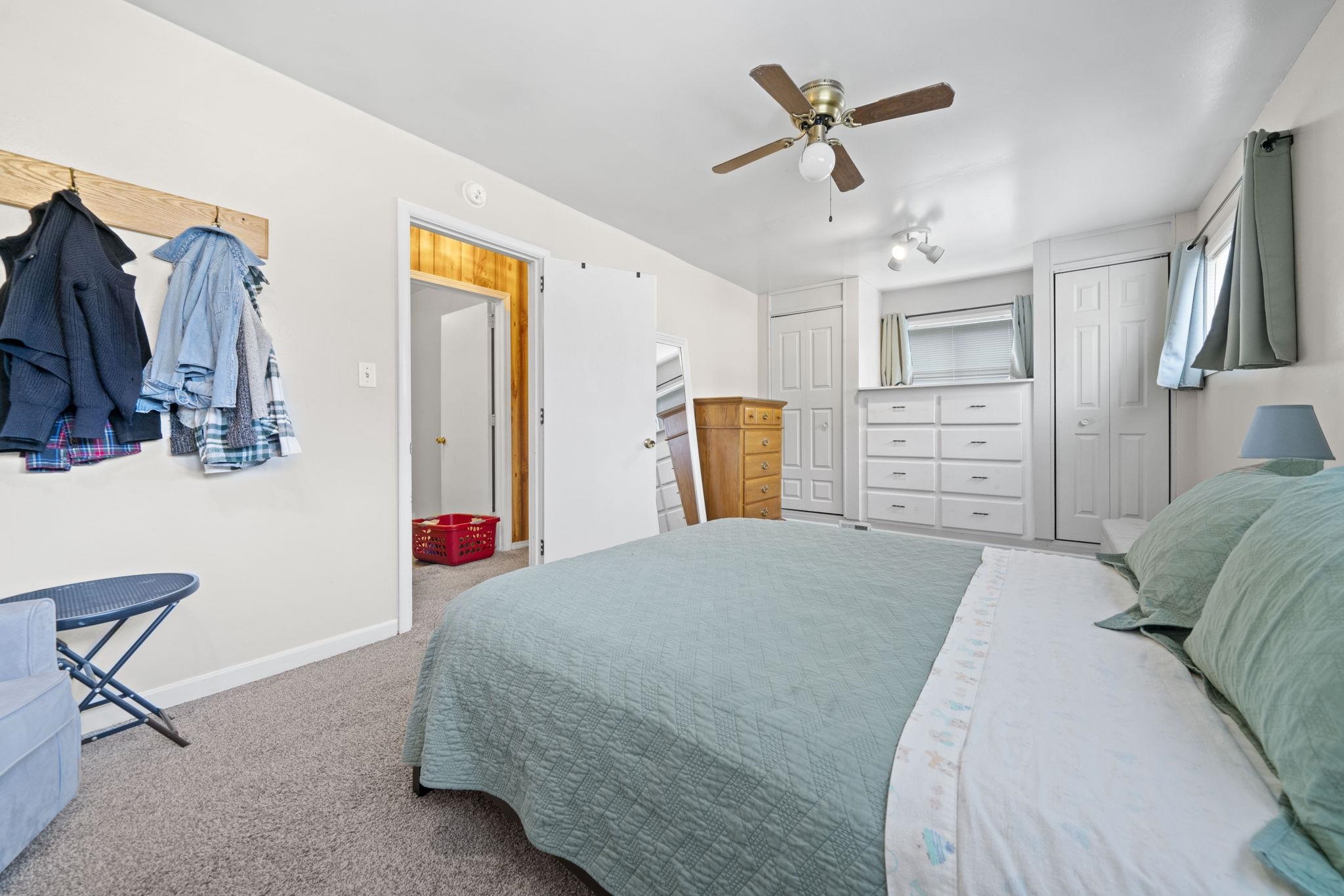 601 West 1st Street Mount Morris, IL 61054 - Photo 17 of 28 a bedroom with a bed dresser and a window