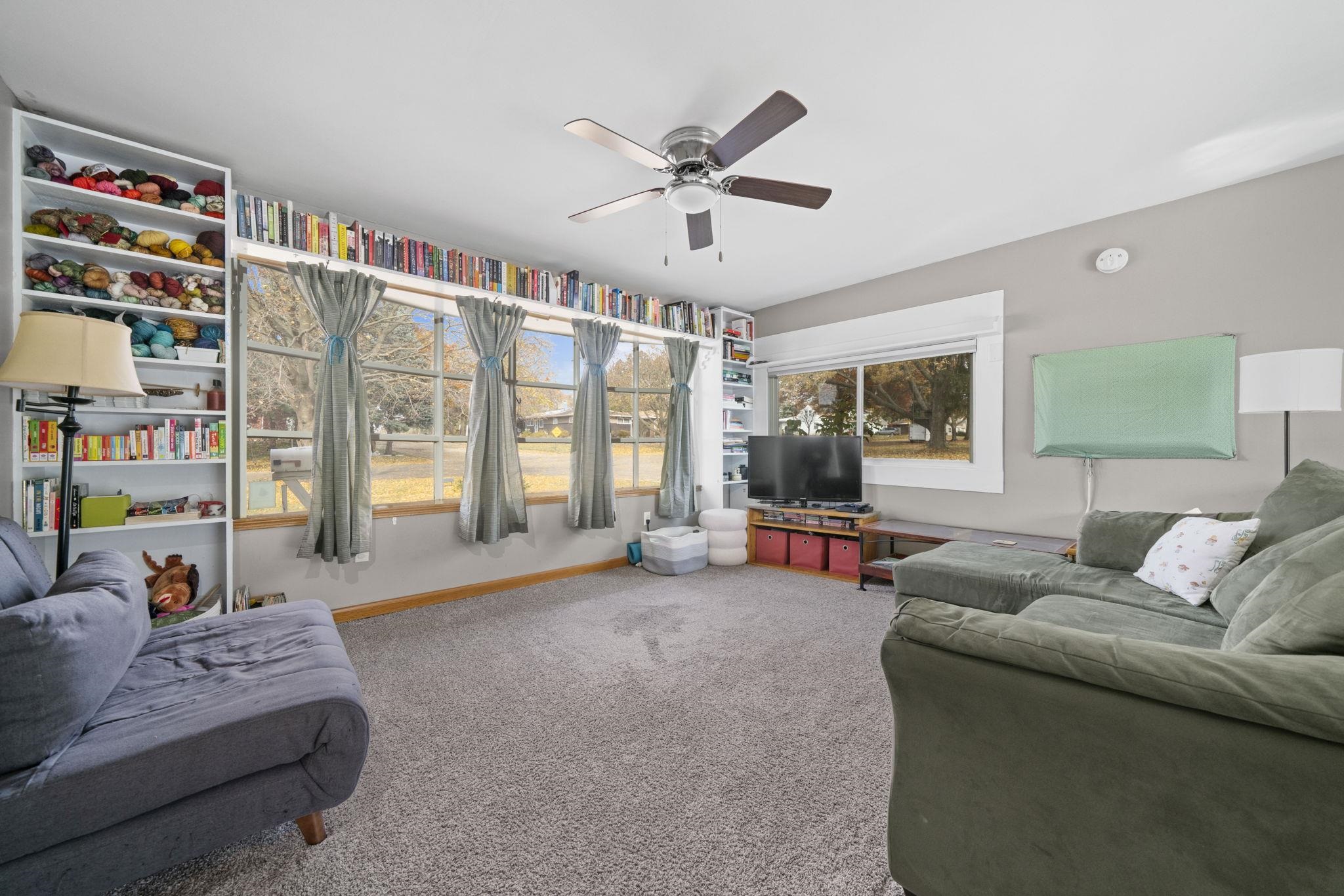 601 West 1st Street Mount Morris, IL 61054 - Photo 3 of 28 a living room with furniture and a large window