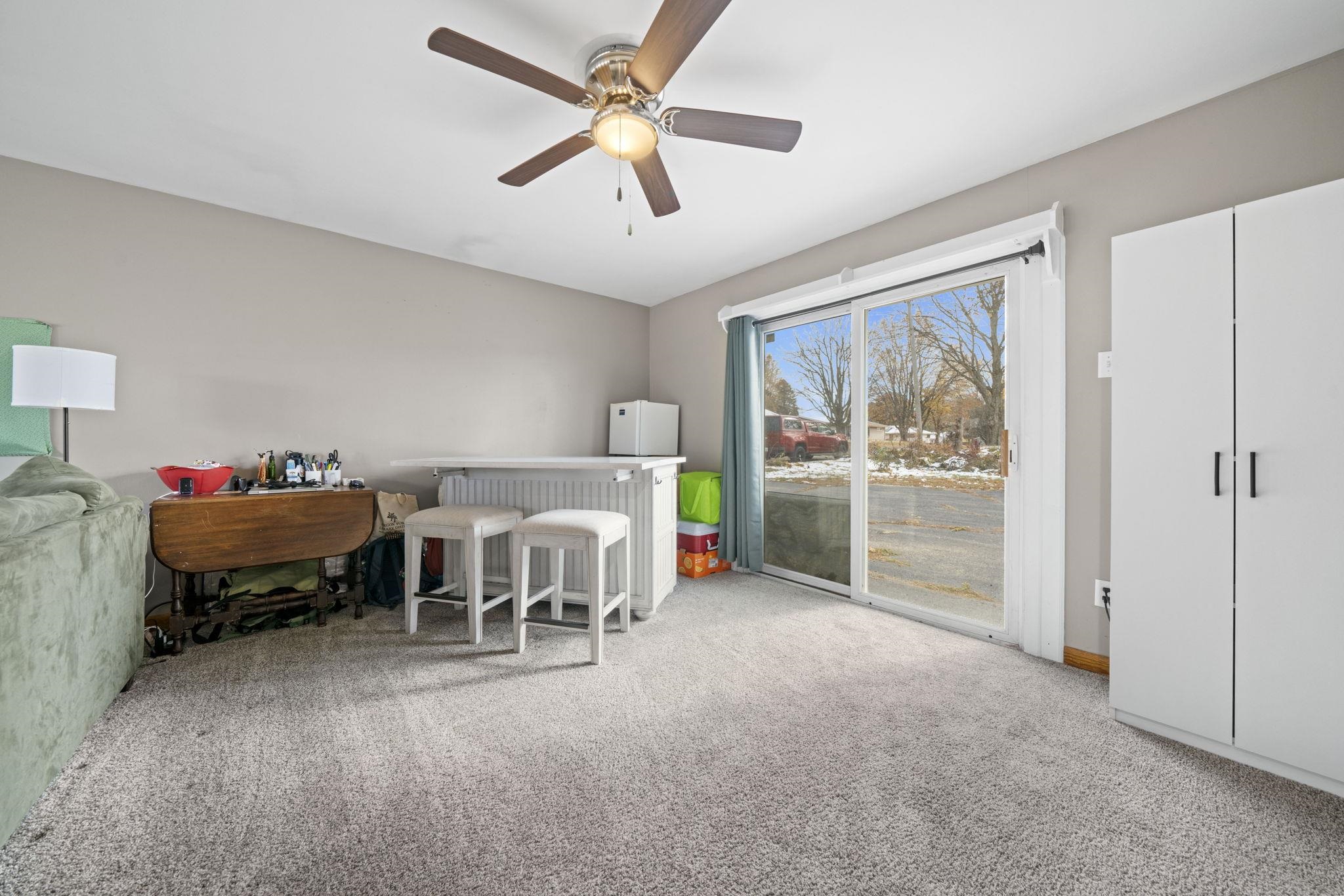 601 West 1st Street Mount Morris, IL 61054 - Photo 7 of 28 a bed room with furniture and a window