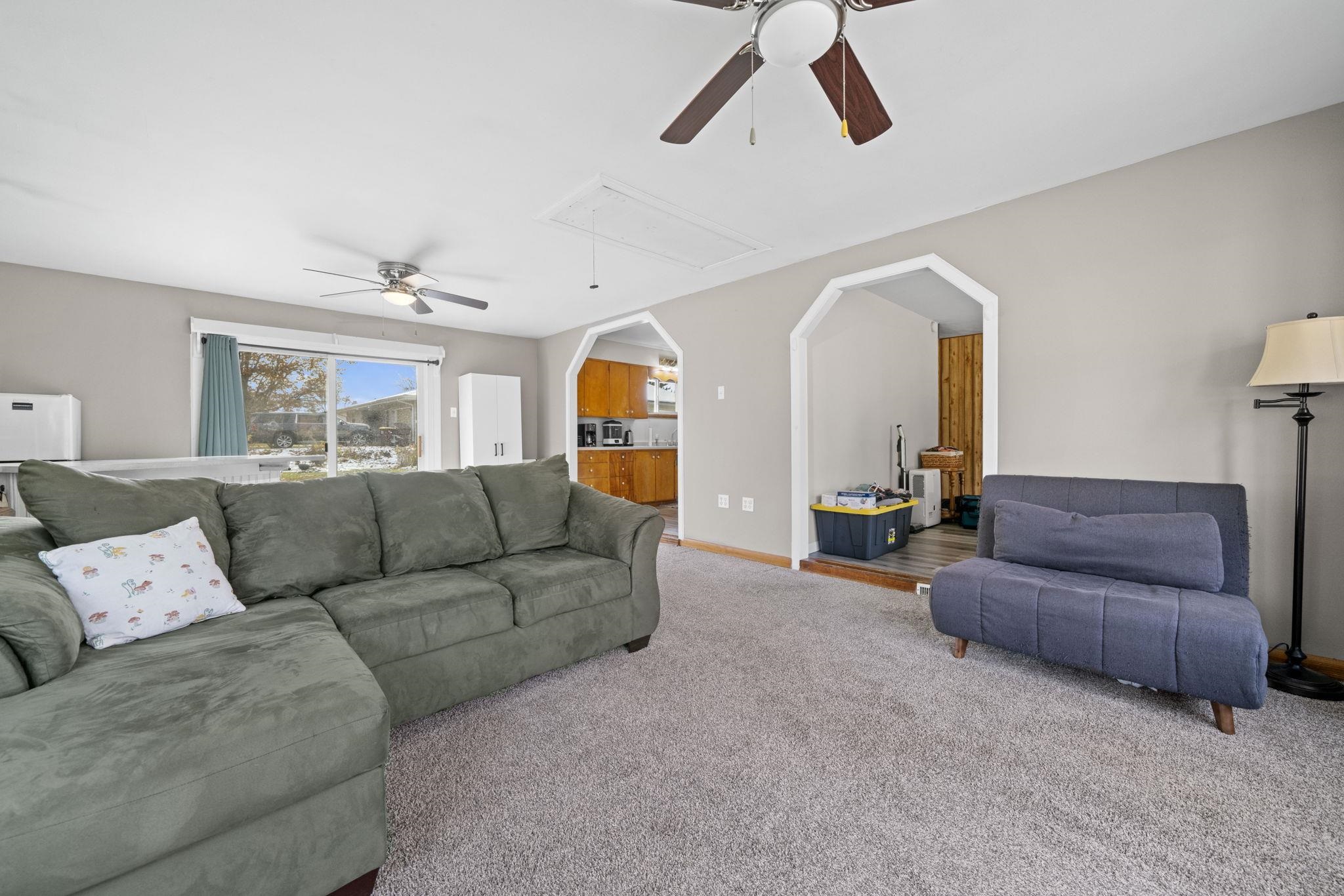 601 West 1st Street Mount Morris, IL 61054 - Photo 8 of 28 a living room with furniture and a wooden floor