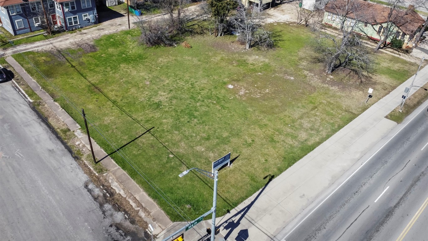 703 North Main Street Taylor, TX 76574 - Photo 15 of 23 a view of a garden from a balcony