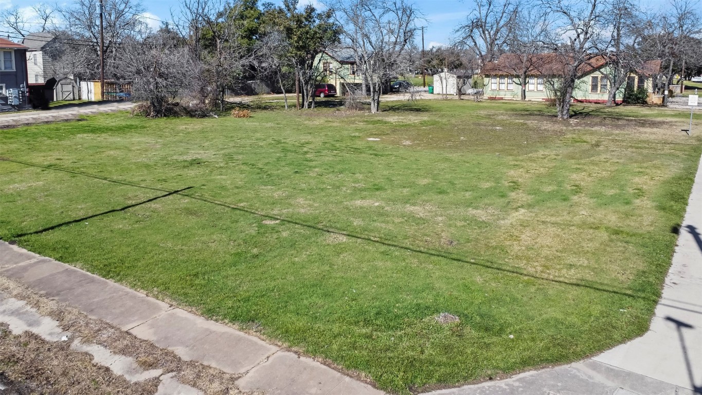 703 North Main Street Taylor, TX 76574 - Photo 21 of 23 a view of outdoor space with garden view