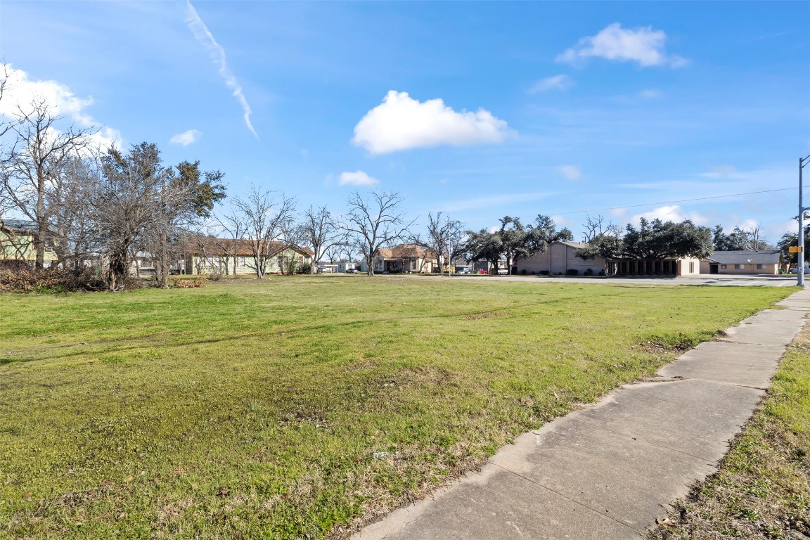 703 North Main Street Taylor, TX 76574 - Photo 8 of 23 a view of a field with an ocean view