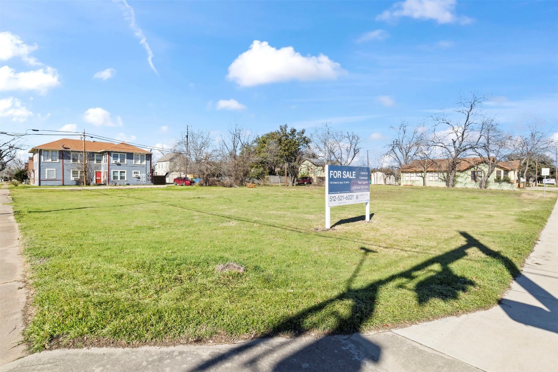 703 North Main Street Taylor, TX 76574 - Photo 10 of 23 a view of a lake with a yard