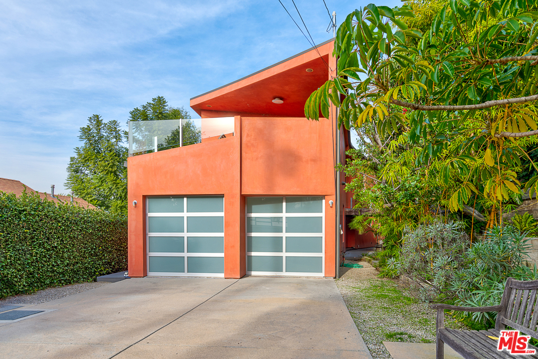 2337 Baxter Street Los Angeles, CA 90039 - Photo 16 of 16 a front view of a house with a yard and garage