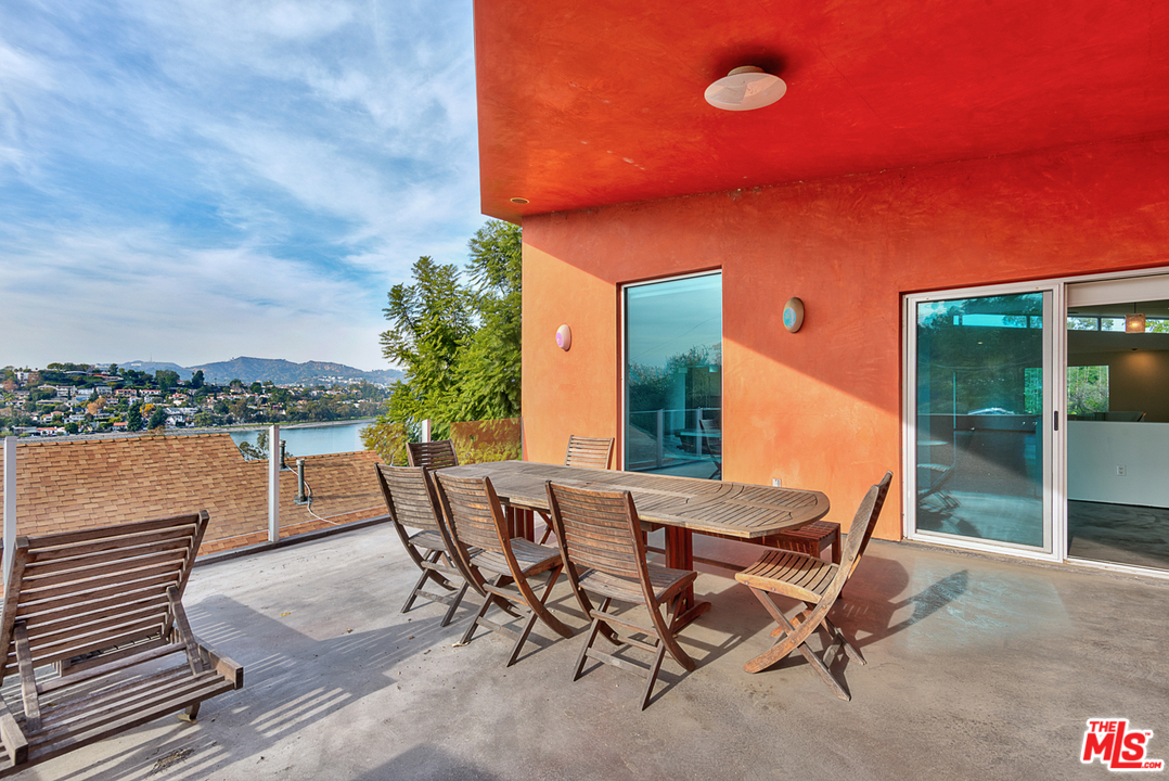 2337 Baxter Street Los Angeles, CA 90039 - Photo 8 of 16 a view of a patio with a table and chairs