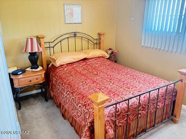 5731 West Flying M Street Tucson, AZ 85713 - Photo 19 of 20 a bed sitting in a bedroom next to a window