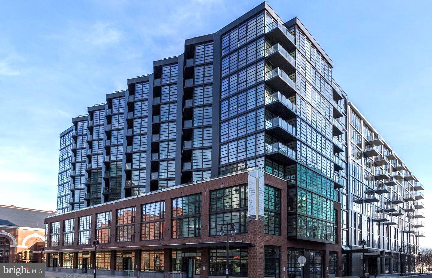 Modern urban living in sleek glass design.