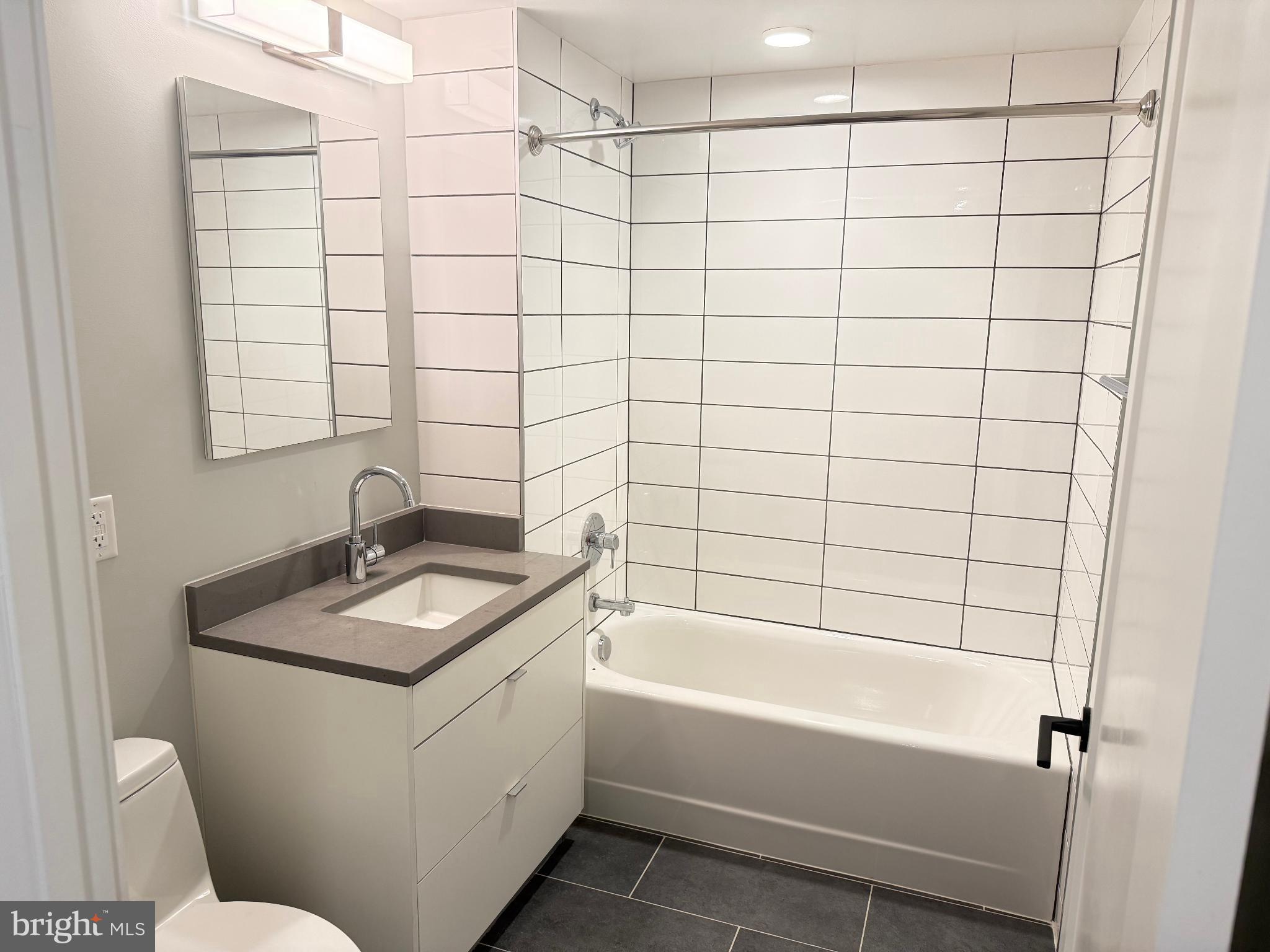 1300 4th Street Southeast, Unit 402 Washington, DC 20003 - Photo 13 of 27 Sleek modern bathroom.