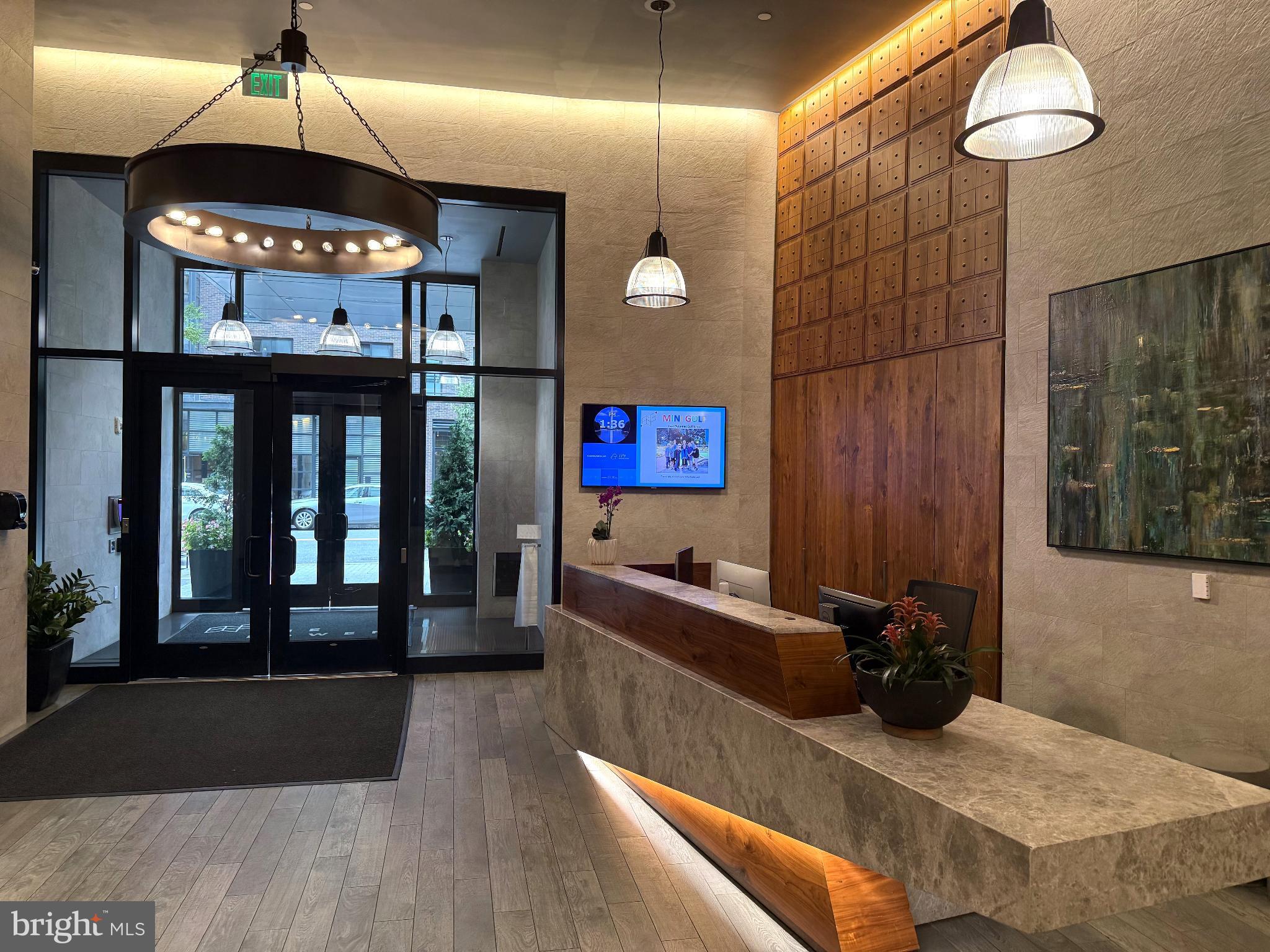 1300 4th Street Southeast, Unit 402 Washington, DC 20003 - Photo 16 of 27 Modern lobby with stylish lighting and decor.