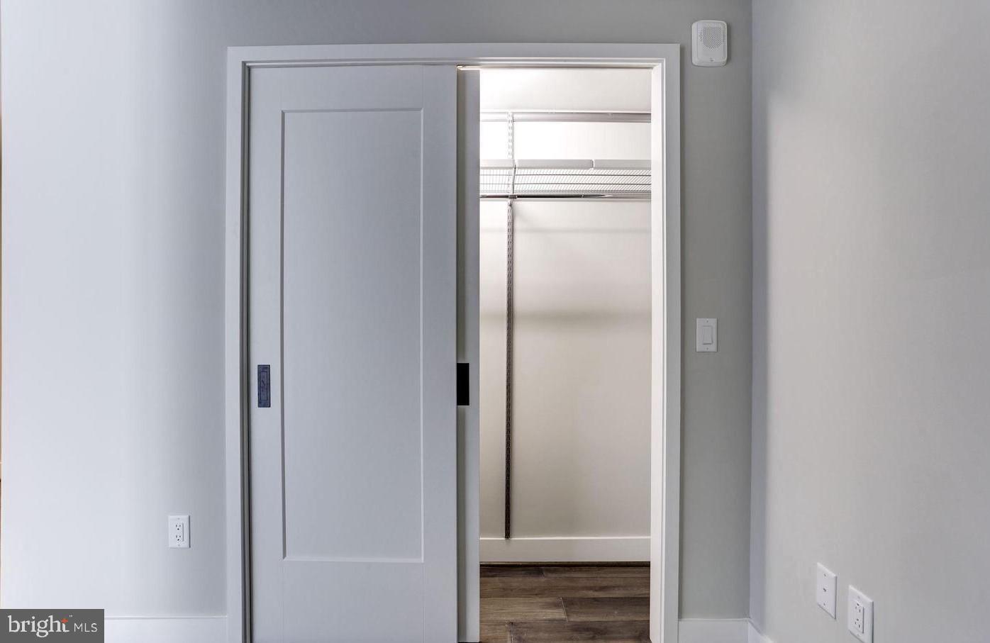 1300 4th Street Southeast, Unit 402 Washington, DC 20003 - Photo 10 of 27 Sleek closet entrance in modern design.