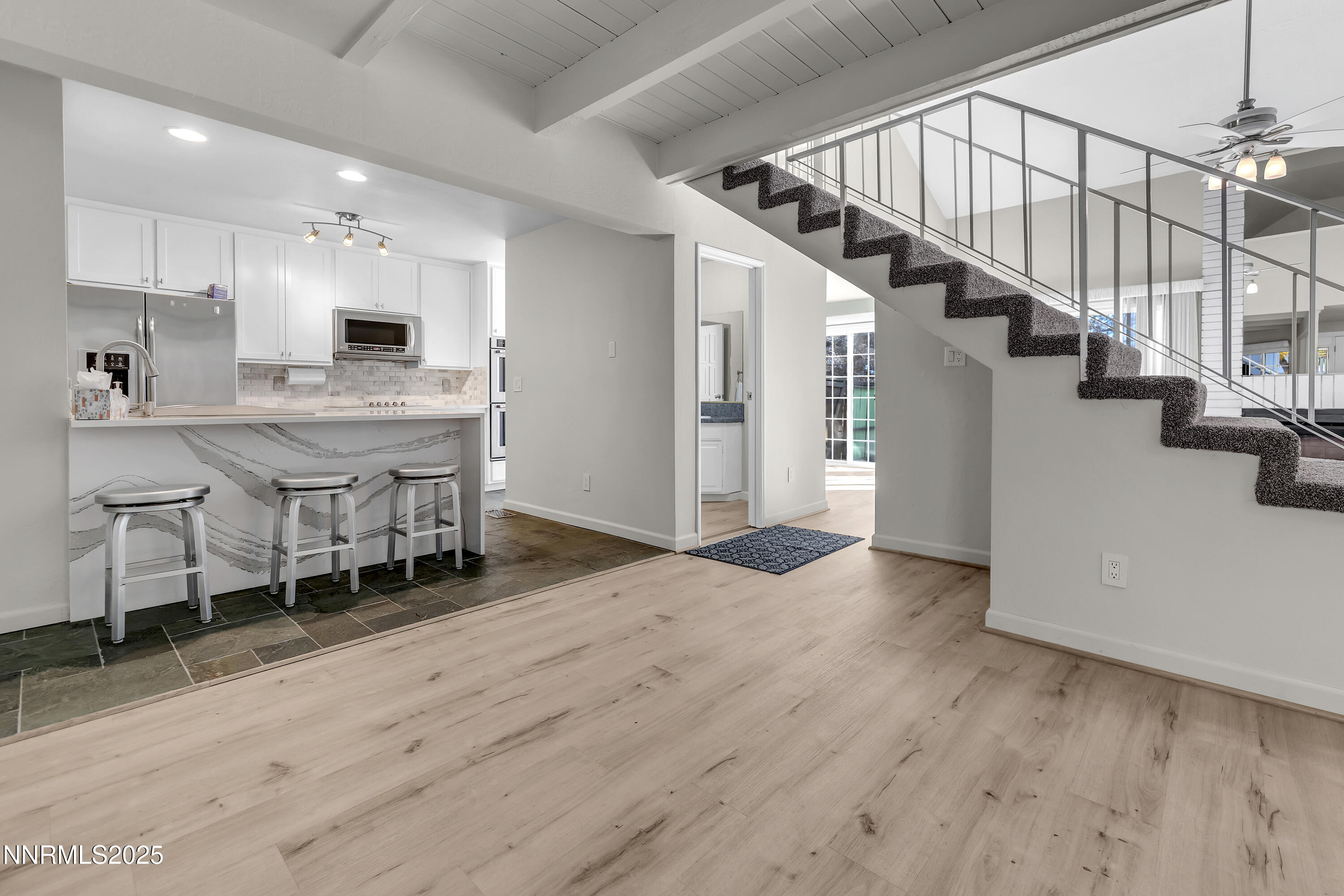 4314 Clyde Court Reno, NV 89509 - Photo 17 of 46 a kitchen with a table and chairs in it