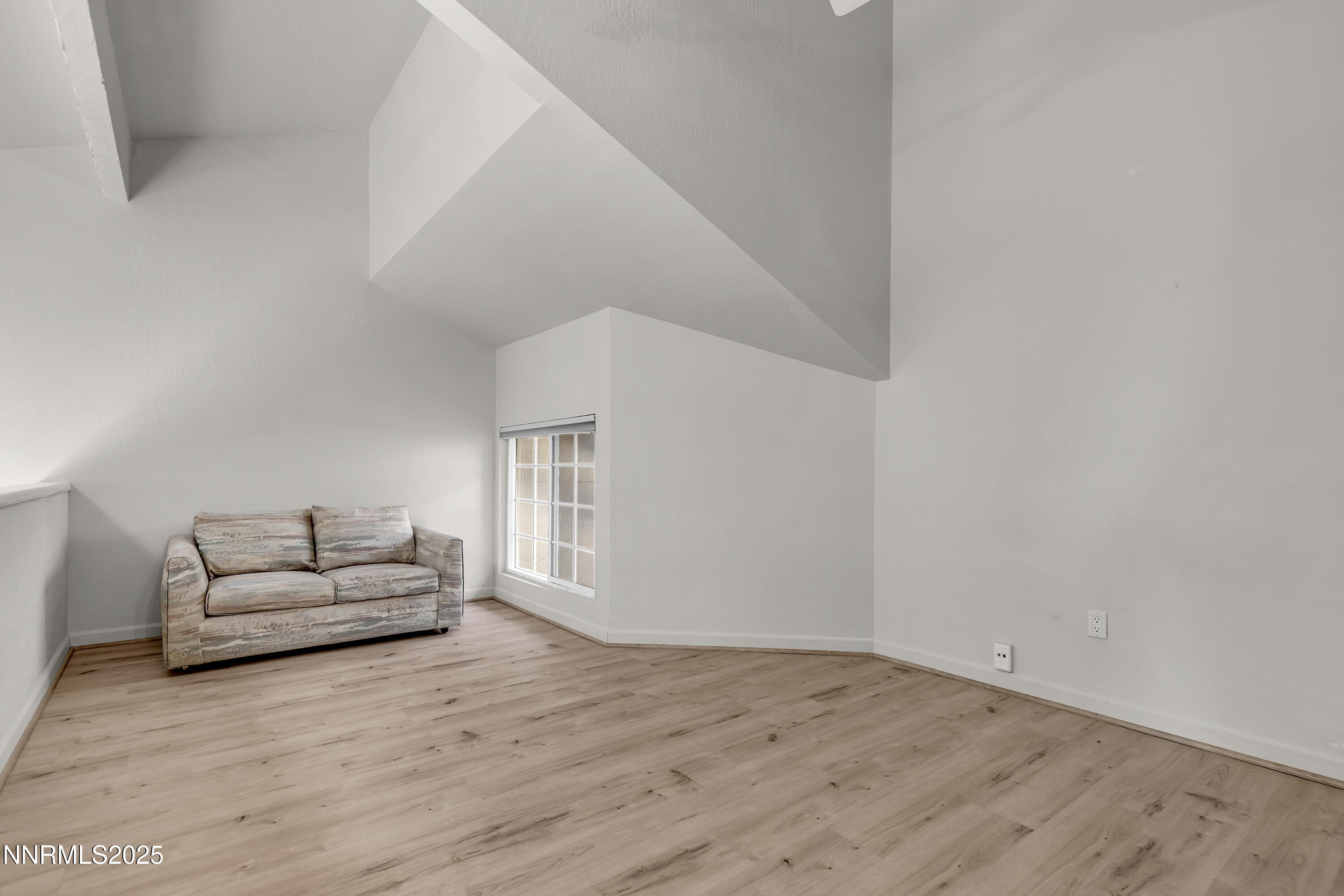 4314 Clyde Court Reno, NV 89509 - Photo 19 of 46 a living room with furniture and a couch