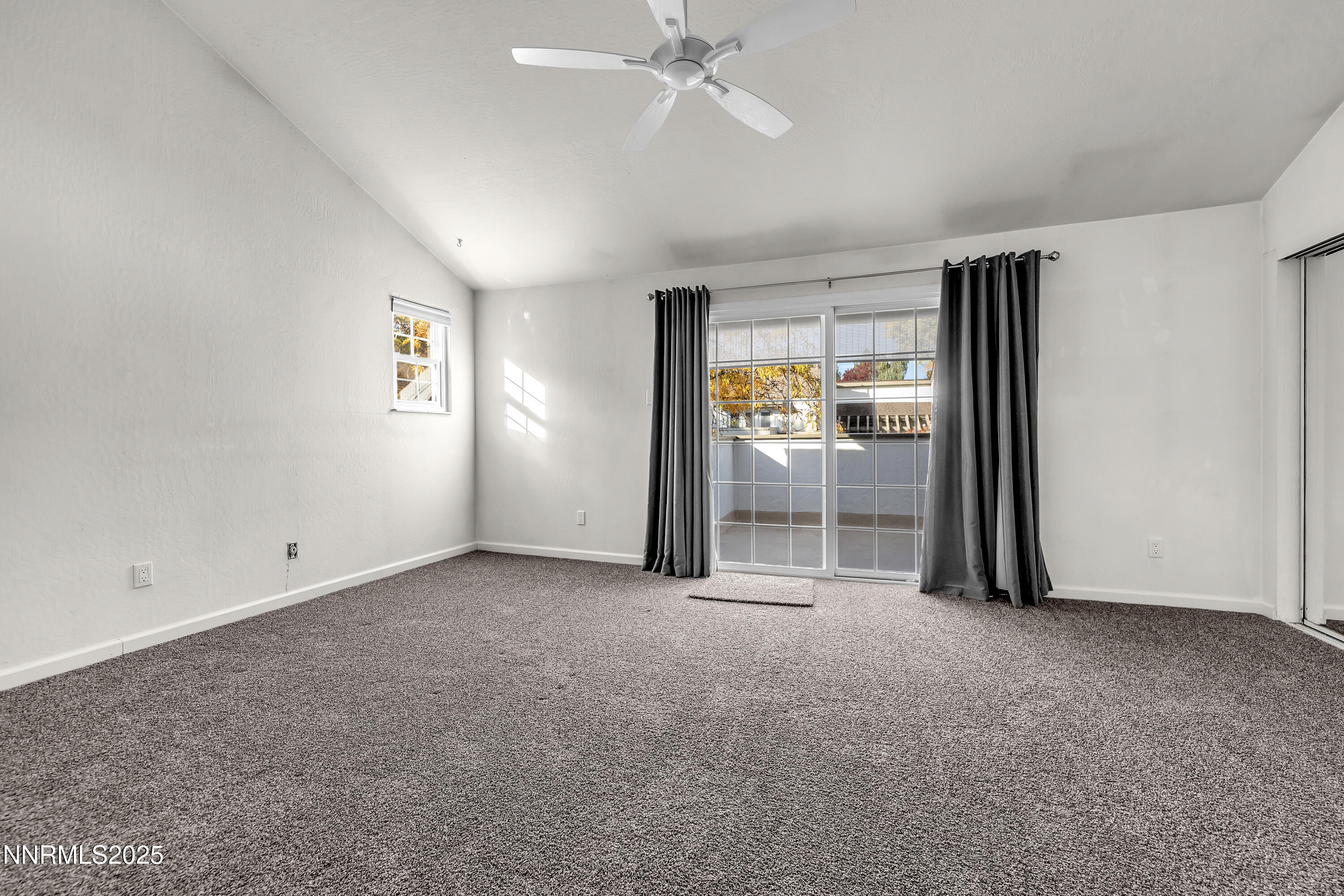 4314 Clyde Court Reno, NV 89509 - Photo 22 of 46 an empty room with windows and painted walls