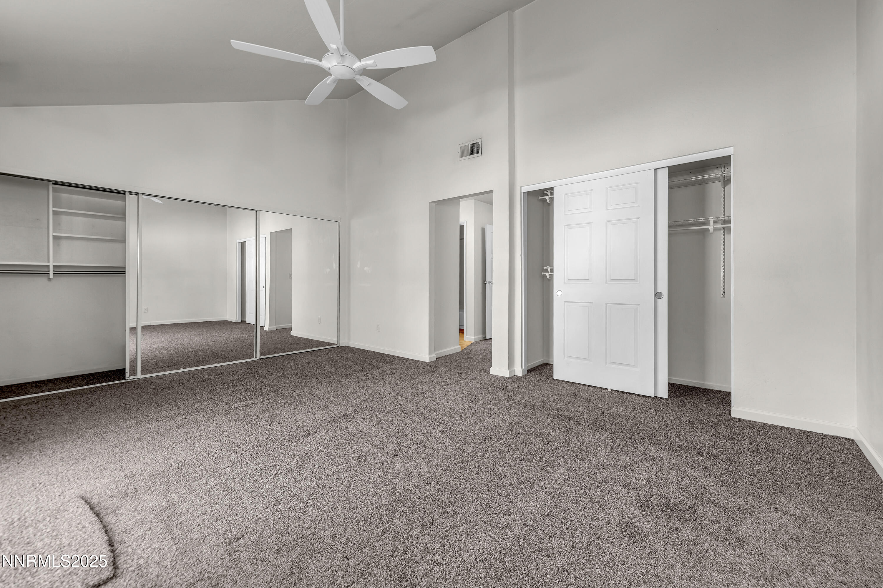 4314 Clyde Court Reno, NV 89509 - Photo 23 of 46 an empty room with closet and a ceiling fan