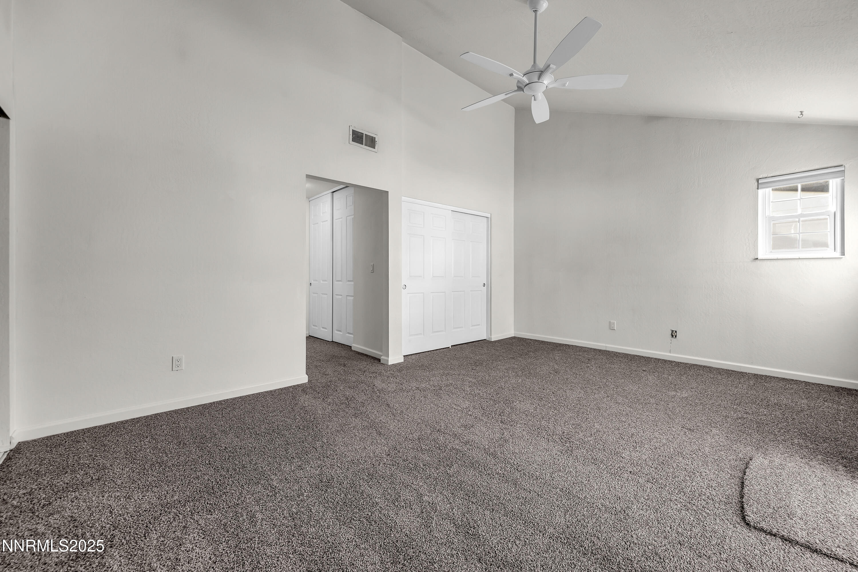 4314 Clyde Court Reno, NV 89509 - Photo 25 of 46 an empty room with windows and fan