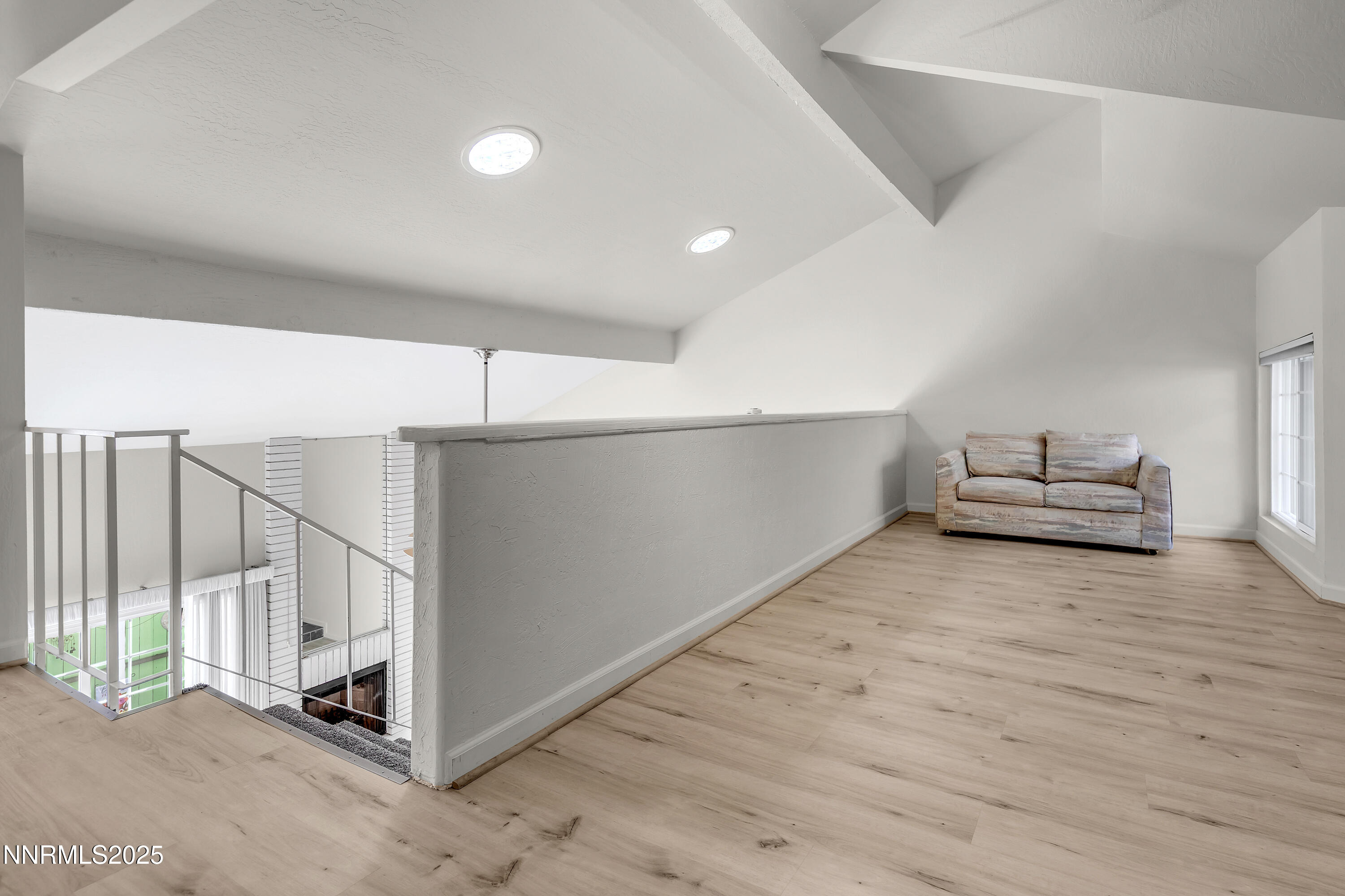 4314 Clyde Court Reno, NV 89509 - Photo 34 of 46 a view of a livingroom with wooden floor and staircase
