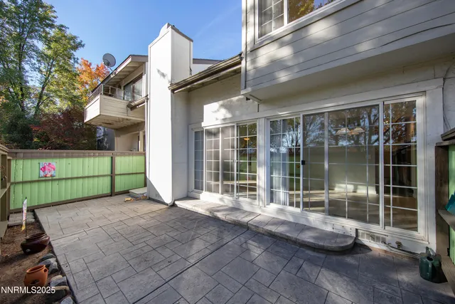 a view of a park with large trees