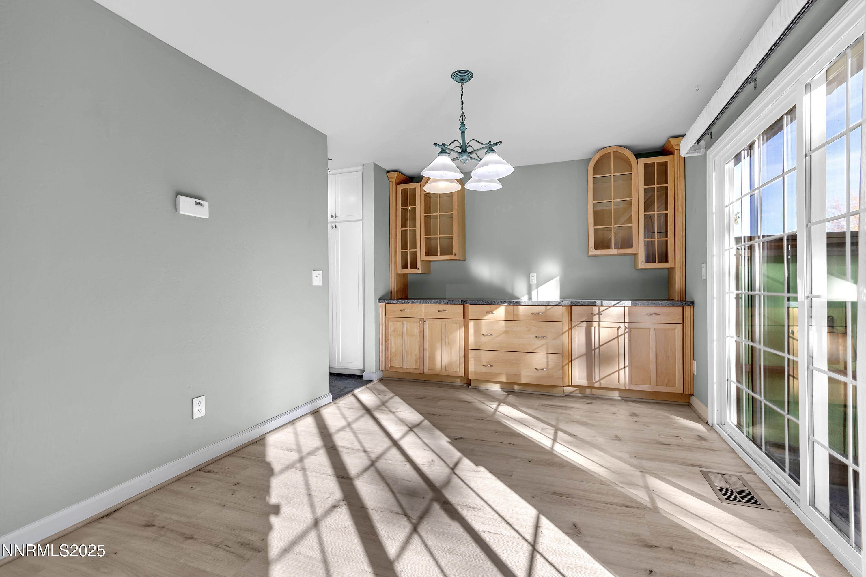 4314 Clyde Court Reno, NV 89509 - Photo 6 of 46 a front view of a house with a large window