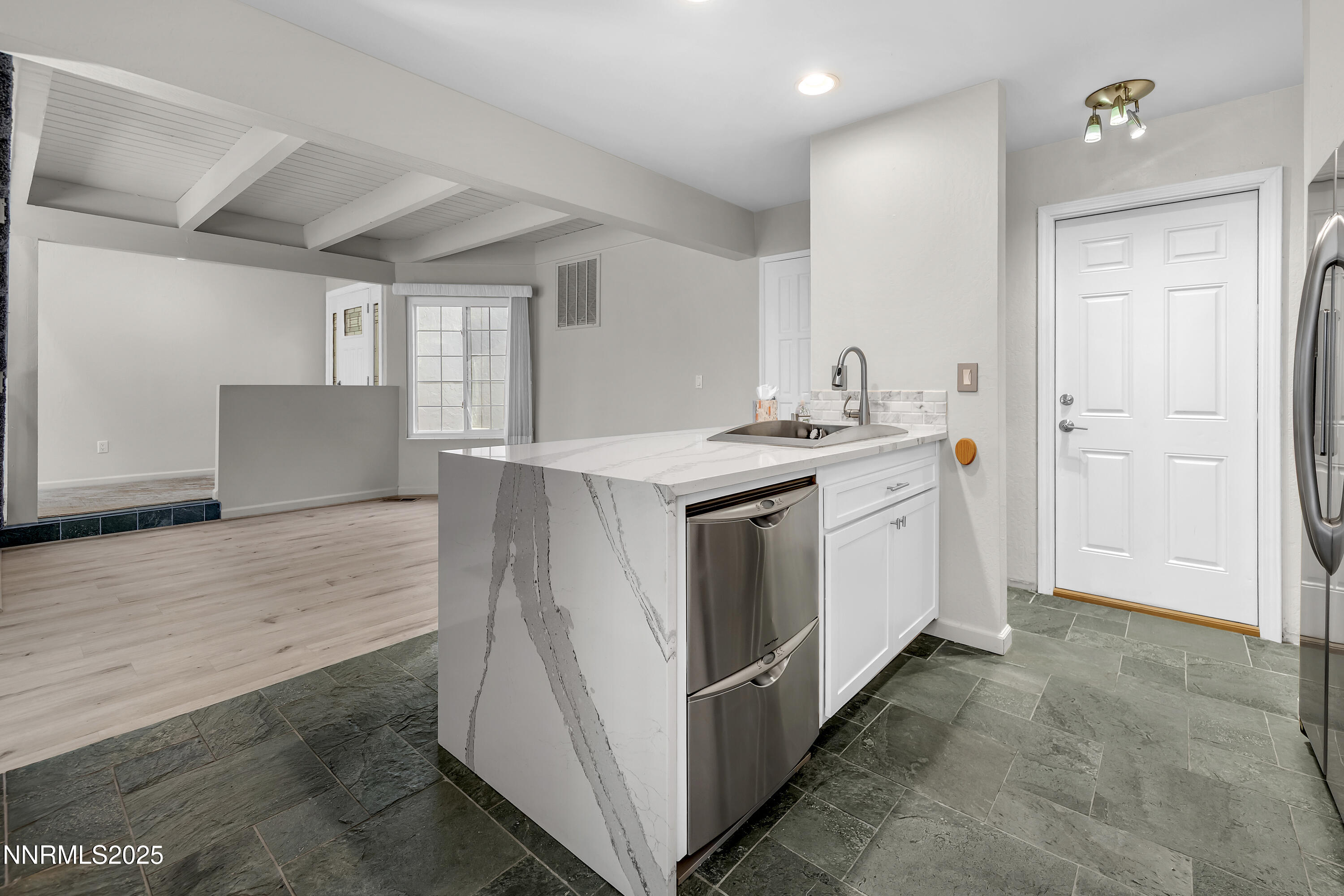 4314 Clyde Court Reno, NV 89509 - Photo 10 of 46 a utility room with cabinets washer and dryer