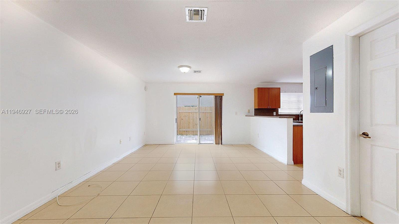14162 Southwest 260th Street, Unit 104 Homestead, FL 33032 - Photo 6 of 43 Living/dinin room