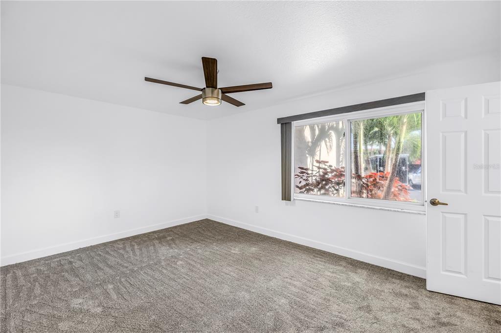 8630 Blind Pass Road St. Pete Beach, FL 33706 - Photo 18 of 26 an empty room with a window