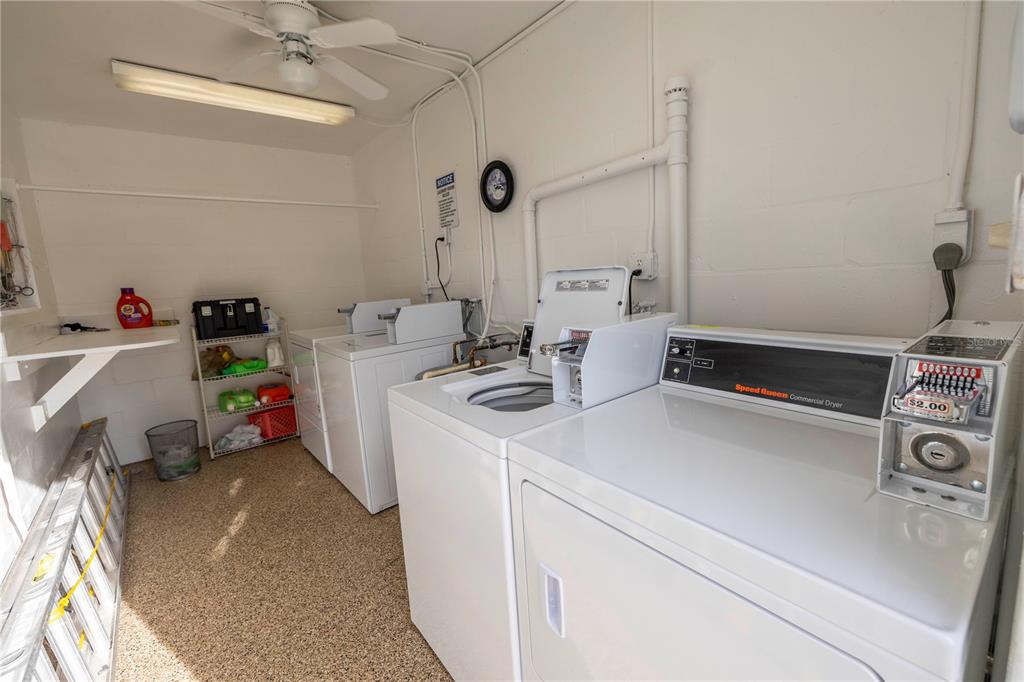 8630 Blind Pass Road St. Pete Beach, FL 33706 - Photo 26 of 26 a utility room with dryer and washer