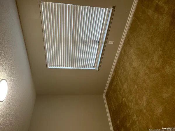 a view of a room with a window